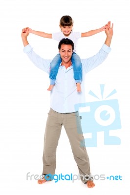 Father With Daughter On Shoulders Stock Photo