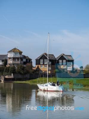 Faversham, Kent/uk - March 29 : Yacht Cruising Down The Swale To… Stock Photo