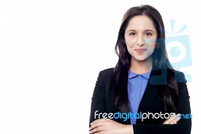 Female Boss Posing With Arms Crossed Stock Photo