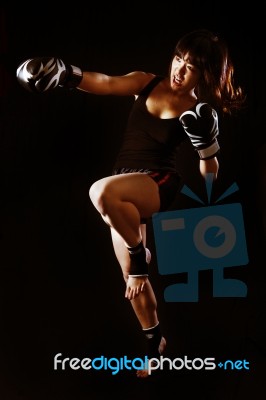 Female Boxer In Action Stock Photo