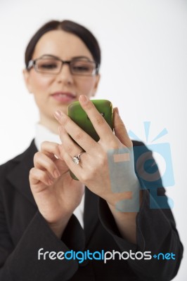 Female Business Professional Using Smart Phone Stock Photo