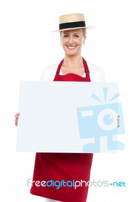 Female Chef Holding Blank Board Stock Photo