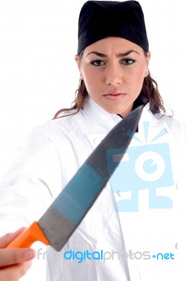 Female Chef Holding Knife Stock Photo