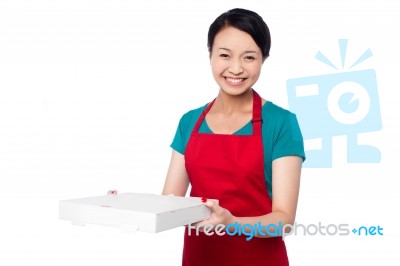 Female Chef Holding White Pizza Box Stock Photo