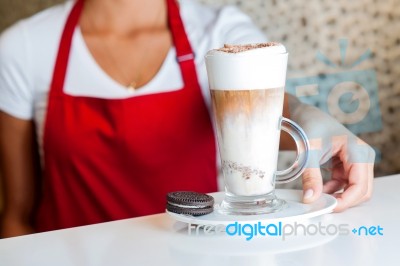 Female Chef Serving Fresh Milkshake Stock Photo