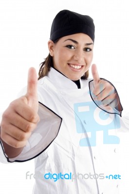 Female Chef Showing Thumbs Up Stock Photo