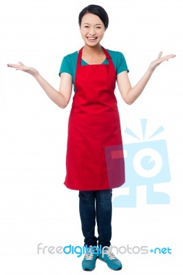 Female Chef Welcoming You With A Smile Stock Photo