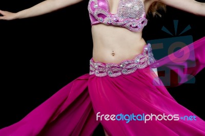 Female Dancer Performing Belly Dance Stock Photo