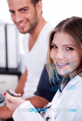 Female Doctor Checking Blood Pressure Stock Photo