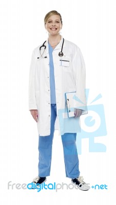 Female Doctor Holding Clipboard Stock Photo