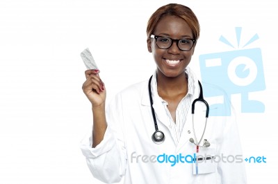 Female Doctor Holding Medicine Stock Photo