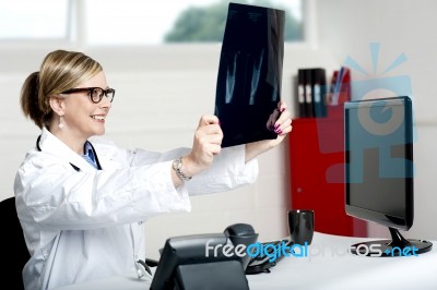 Female Doctor Holding X Ray Stock Photo