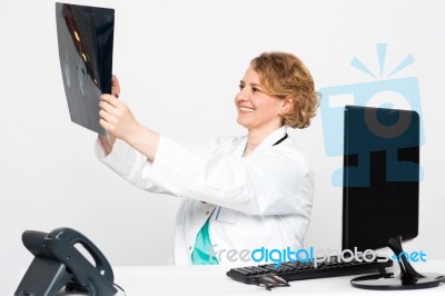 Female Doctor Holding X Ray Stock Photo