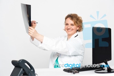 Female Doctor Holding X Ray Stock Photo