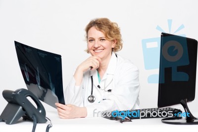 Female Doctor Holding X Ray Stock Photo