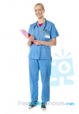 Female Doctor In Blue Medical Suit Stock Photo