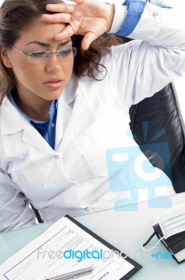 Female Doctor In Tension Stock Photo