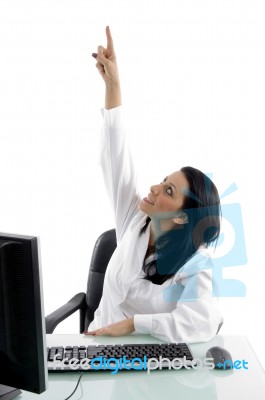 Female Doctor Pointing Up Stock Photo