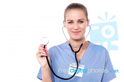 Female Doctor Posing With Stethoscope Stock Photo