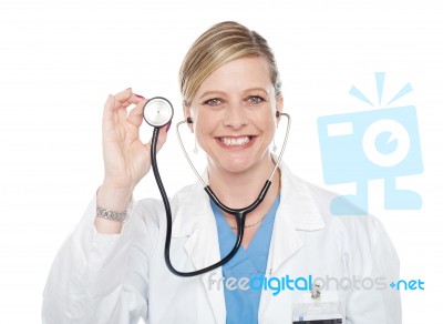 Female Doctor Showing Stethoscope Stock Photo