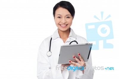 Female Doctor Using Tablet Pc Stock Photo