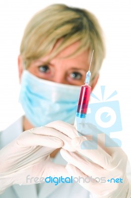 Female Doctor With Syringe Stock Photo