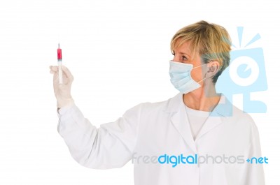 Female Doctor With Syringe Stock Photo