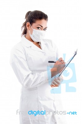 Female Doctor Writing Medical Prescription Stock Photo