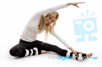 Female doing stretching Exercise Stock Photo