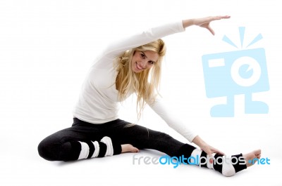 Female doing stretching Exercise Stock Photo