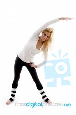 Female doing stretching Exercise Stock Photo