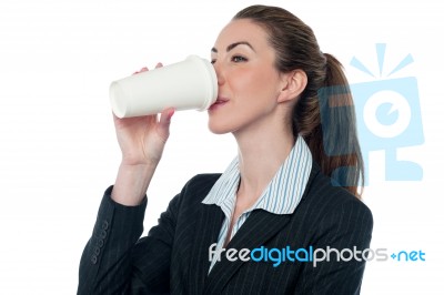 Female Employer Enjoying Beverage Stock Photo