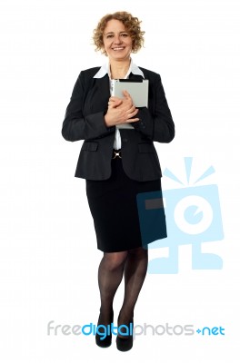 Female Excutive Holding Apple I-pad Stock Photo