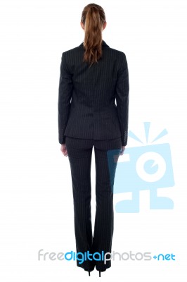 Female Executive Facing The Wall Stock Photo