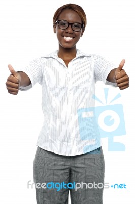 Female Executive Showing Thumbs Up Stock Photo