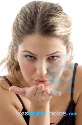 Female Giving Flying Kiss Stock Photo