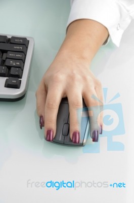 female Hand Operating Mouse Stock Photo