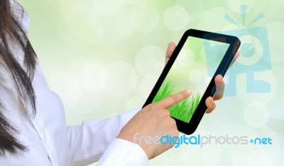 Female Hand Pressing Tablet Pc Stock Photo