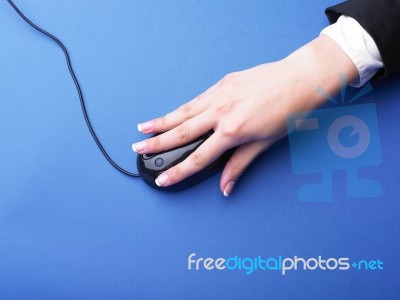 Female Hand Using Mouse Stock Photo