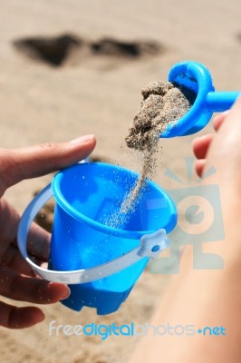 Female Hands And Toy Stock Photo