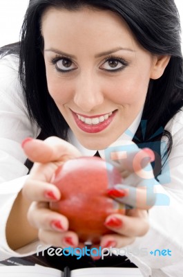 Female Holding An Apple Stock Photo