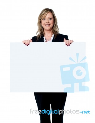 Female holding blank board Stock Photo