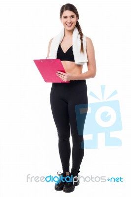 Female Instructor With A Diet Chart Stock Photo