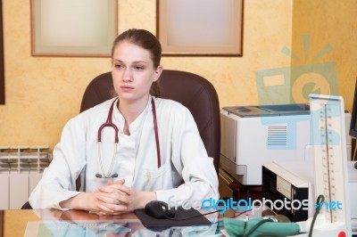 Female Medical Doctor In A Hospital Office Stock Photo