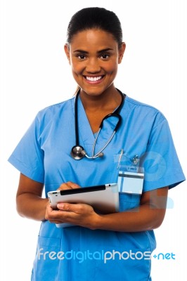 Female Physician Holding Tablet Pc Stock Photo