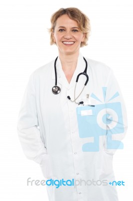 Female Physician In White Uniform Stock Photo