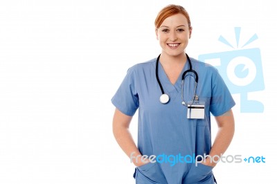 Female Physician Posing Against White Stock Photo