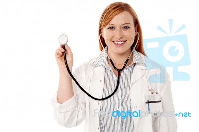 Female Physician Posing With Stethoscope Stock Photo