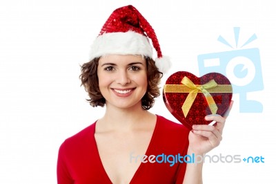 Female Santa Showing Xmas Gift Over White Stock Photo