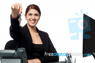 Female Secretary Offering You Cabin Key Stock Photo